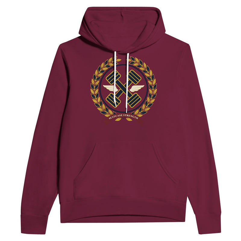 Suitcase Strength unisex pullover hoodie for travelling professionals, printed with a gold laurel-wreath crest with navy crossed dumbbells, cream aviator wings and a SUITCASE STRENGTH ribbon — product photo 8 of 12
