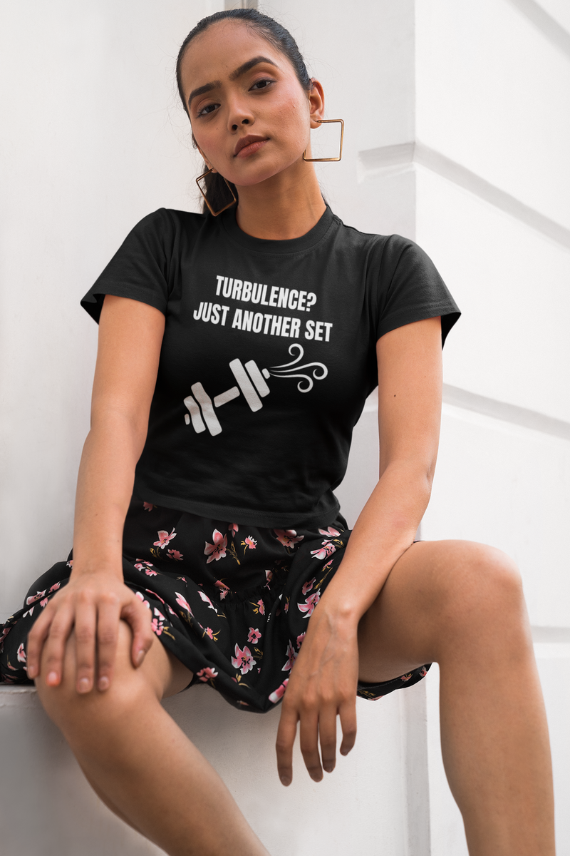 Women's crop top for road warriors — black travel-fitness apparel designed by pilots for the hotel gym