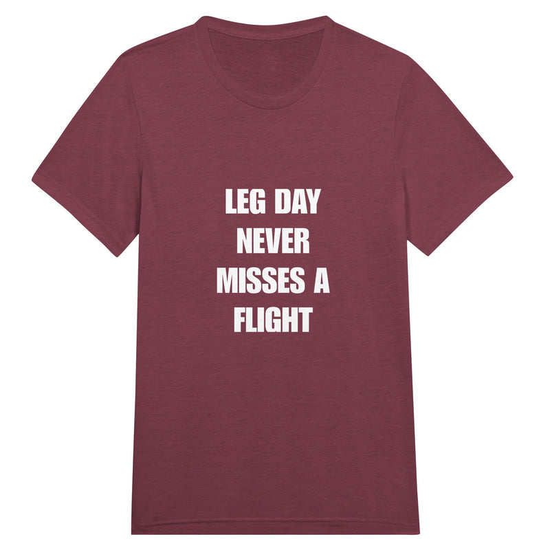 Leg Day Never Misses a Flight unisex triblend tee for travelling professionals, printed with a laurel-wreath crest with crossed dumbbells, aviator wings and a LEG DAY NEVER MISSES A FLIGHT ribbon — product photo 12 of 19
