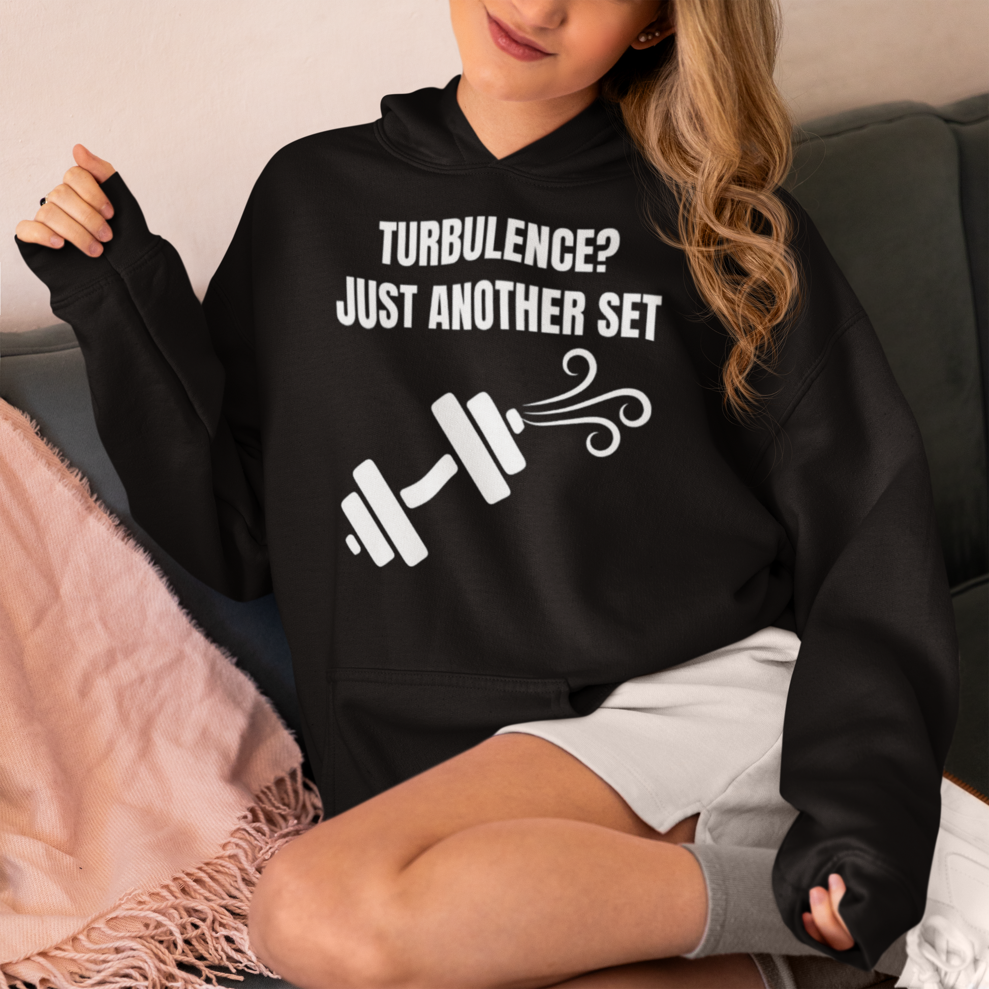 Travel Workout Hoodie — pilot-designed unisex hoodie, hotel lounge scene
