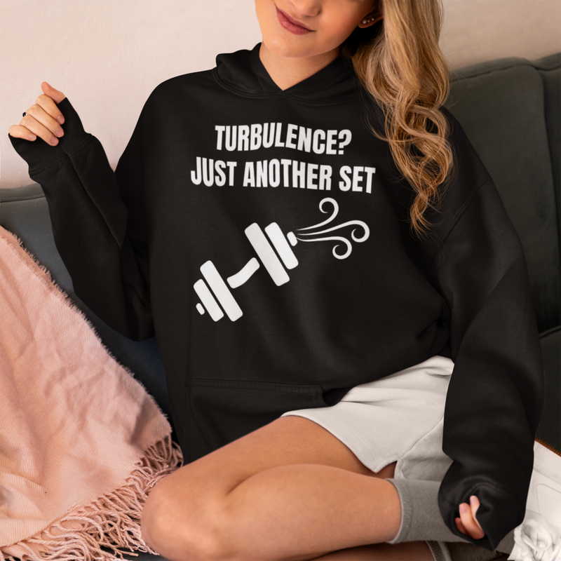 Travel Workout Hoodie — pilot-designed unisex hoodie, hotel lounge scene