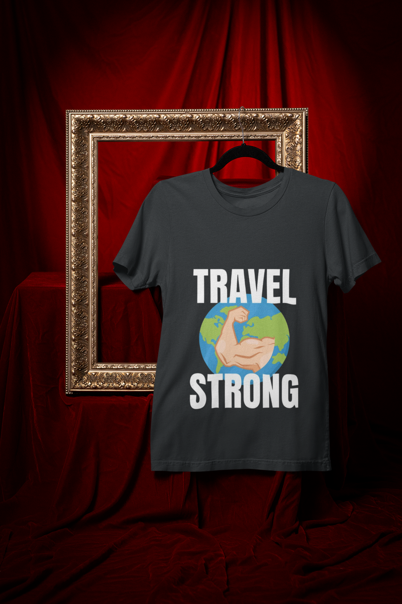 Travel Strong Unisex Travel Fitness Tee in Black hanging in a gold vintage frame — capsule wardrobe hero piece for traveling professionals
