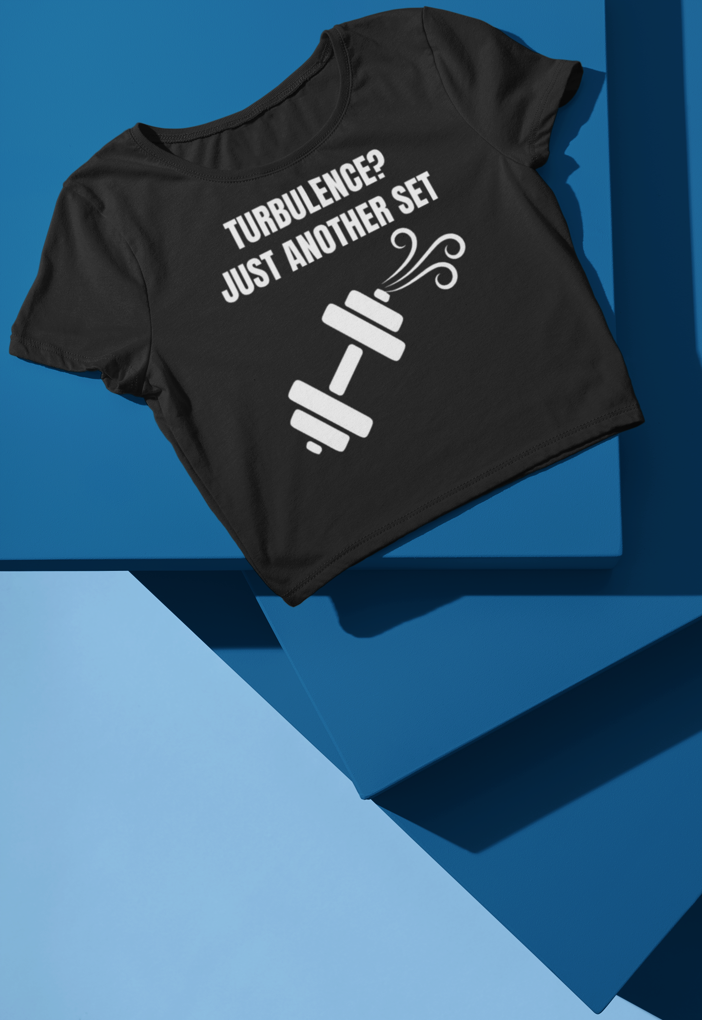 Black women's crop top flat-lay — Turbulence? Just Another Set travel fitness apparel
