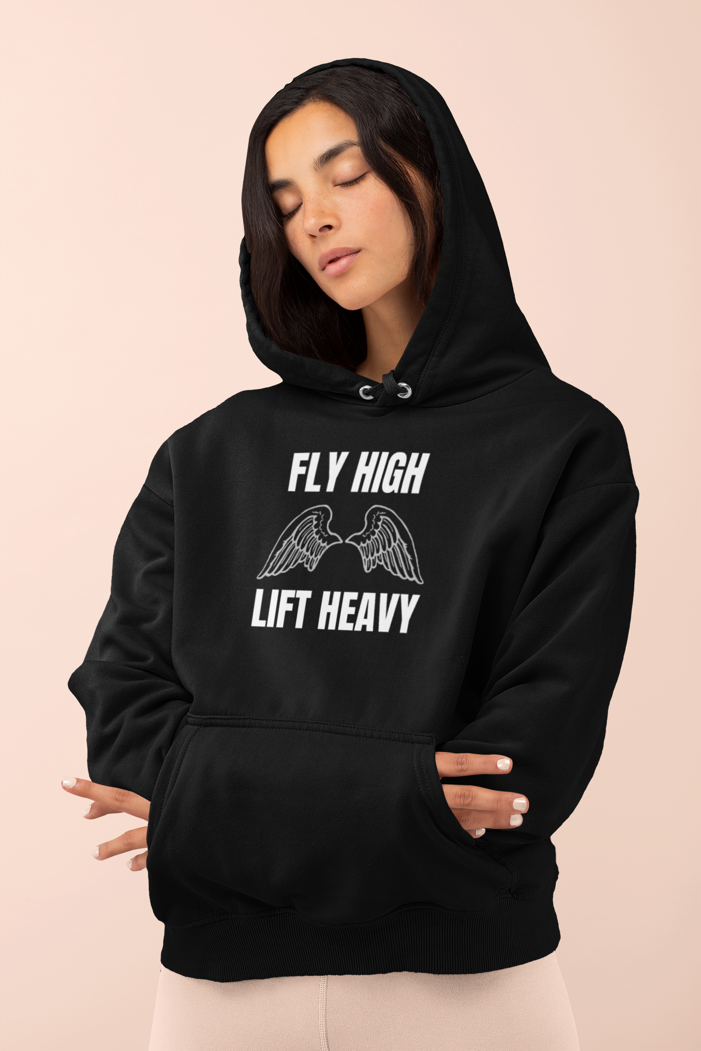 Woman in navy Fly High Lift Heavy hoodie — premium travel fitness apparel for flight attendants and travel nurses