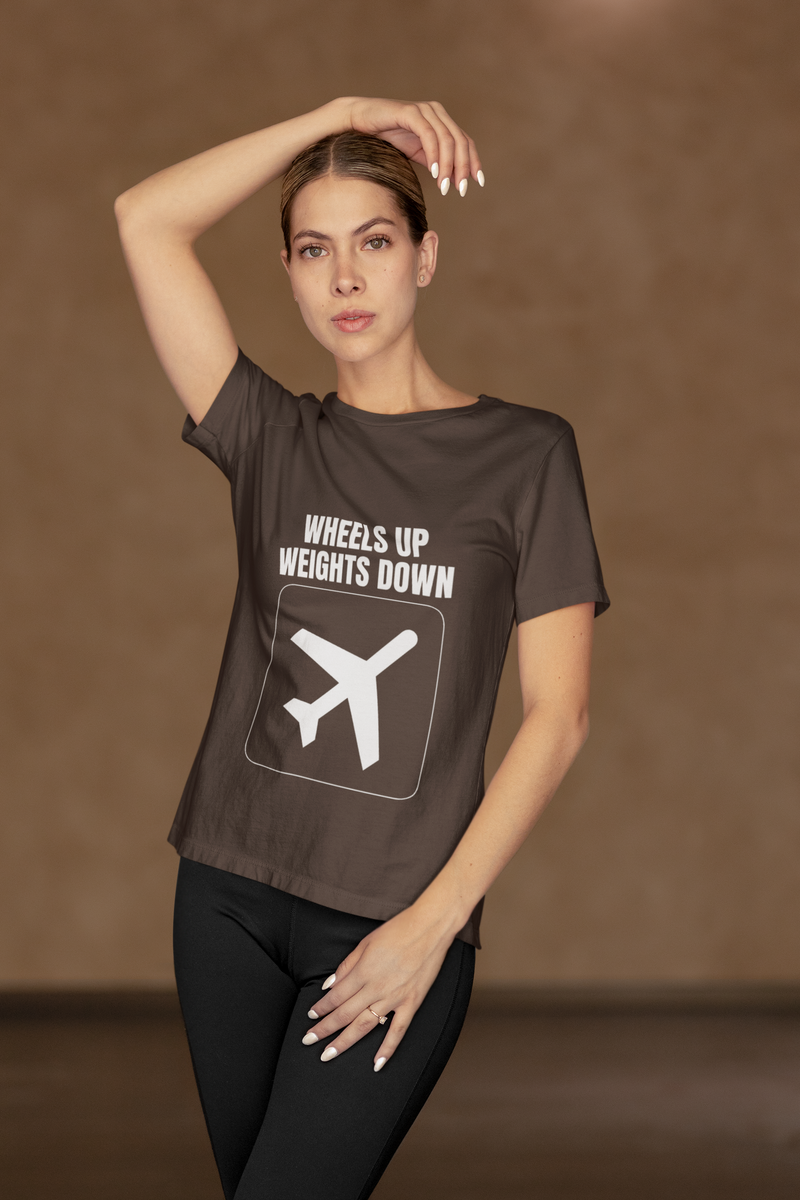 Woman wearing Wheels Up Weights Down travel gym t-shirt in dark chocolate, commercial studio lifestyle photography for airline pilots and flight attendants