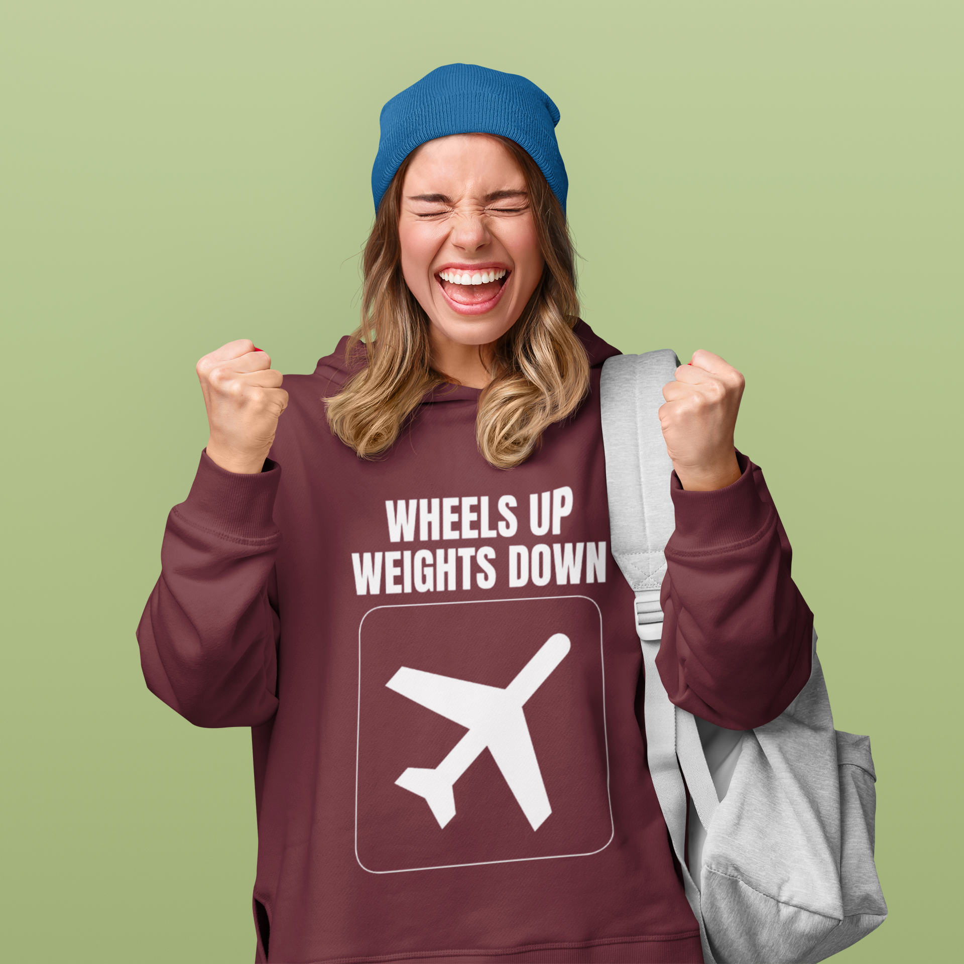 Travel workout hoodie on smiling road warrior — flight tested technical fit for the hotel gym
