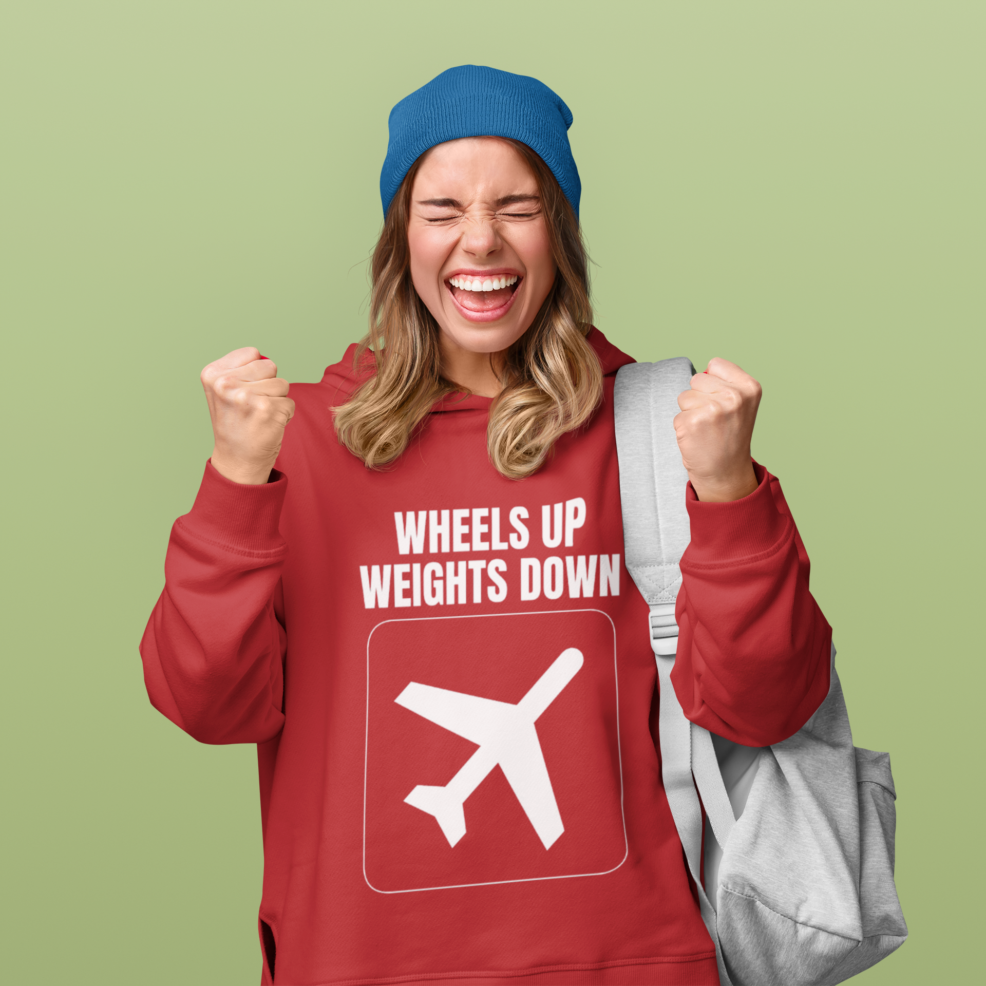 Flight tested travel workout hoodie in red — lifestyle shot for the modern road warrior