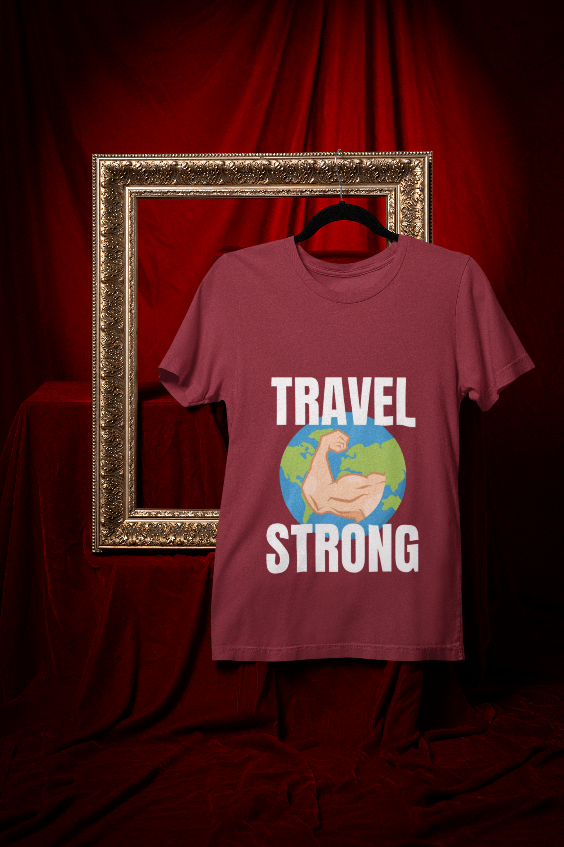 Travel Strong unisex t-shirt in Cardinal hanging in vintage frame — designed by pilots for the hotel gym