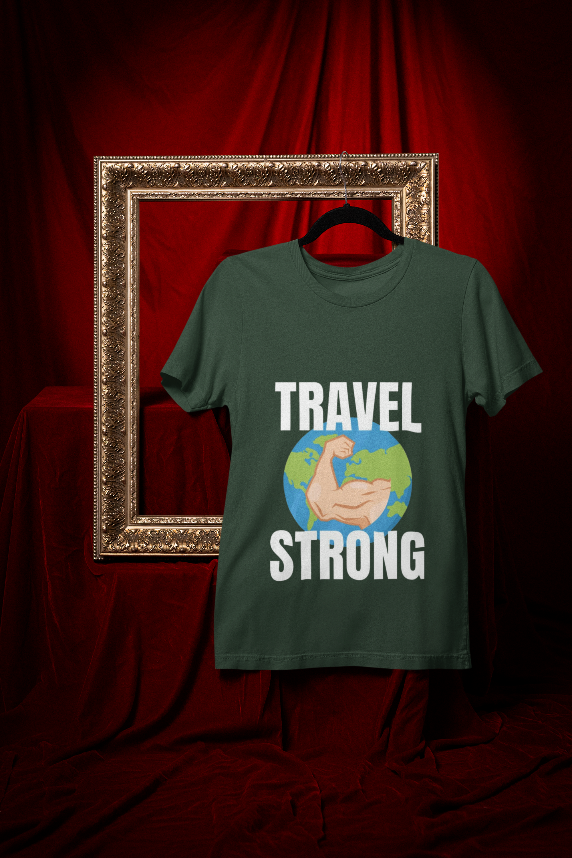 Travel Strong unisex t-shirt in Forest Green hanging in vintage frame — designed by pilots for the hotel gym