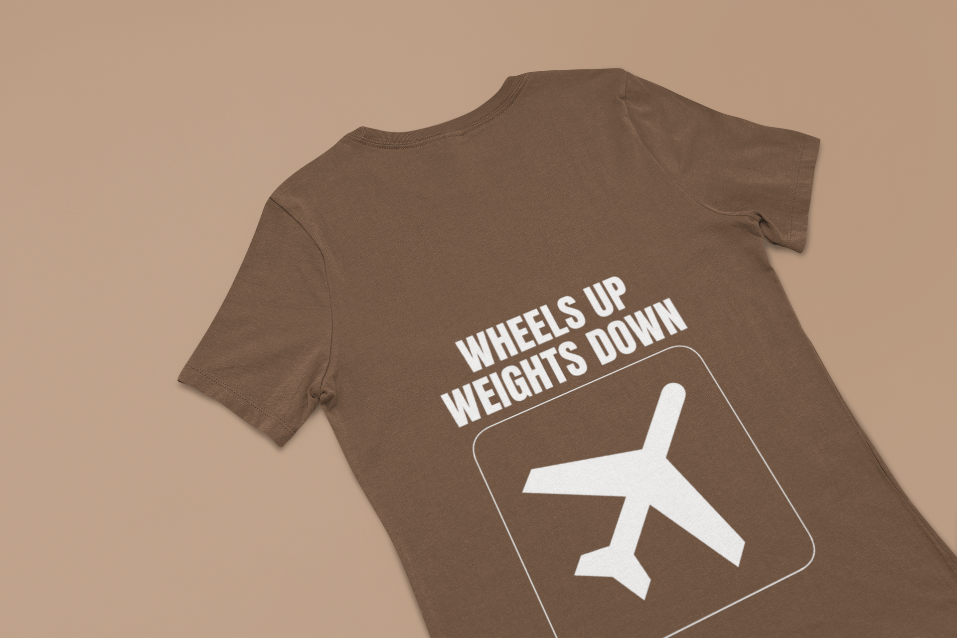 Brown savana Wheels Up Weights Down unisex travel gym t-shirt flat-lay, capsule wardrobe travel apparel