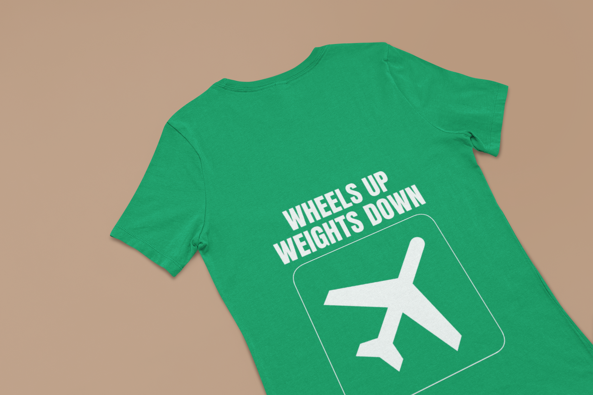Irish green Wheels Up Weights Down unisex travel gym t-shirt flat-lay, flight-tested travel gym apparel