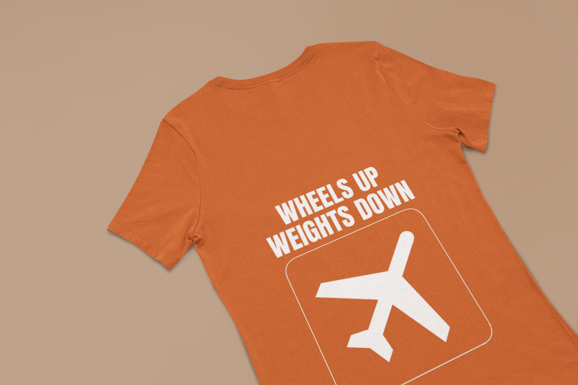 Orange Wheels Up Weights Down unisex travel gym t-shirt flat-lay, technical tailored fit for traveling professionals