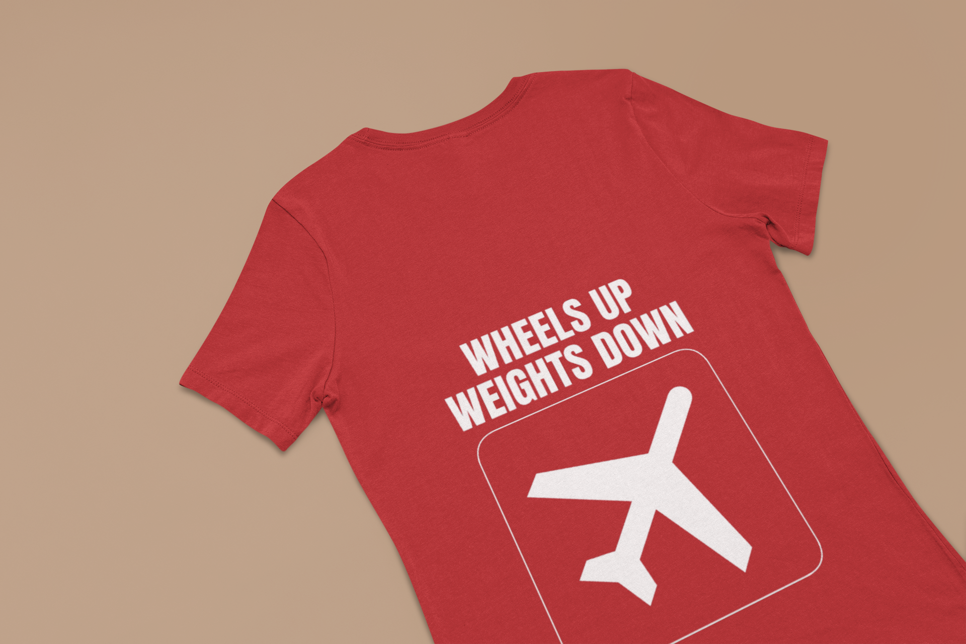 Red Wheels Up Weights Down unisex travel gym t-shirt flat-lay, premium travel fitness apparel for road warriors